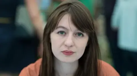 Irish author Sally Rooney declares she will not travel to the UK because of arrest fears